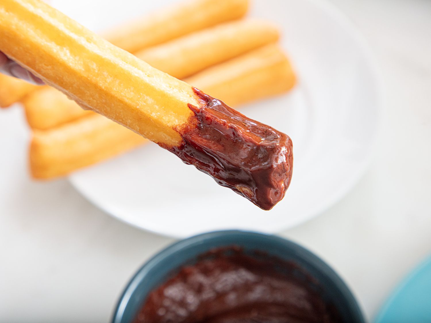Churro dipped in chocolate 