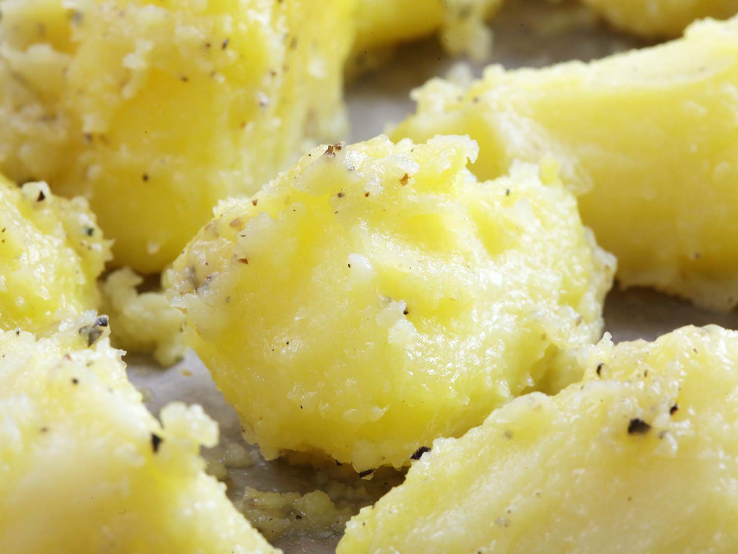 Boiled potatoes with a soft, mashed potato-like exterior.