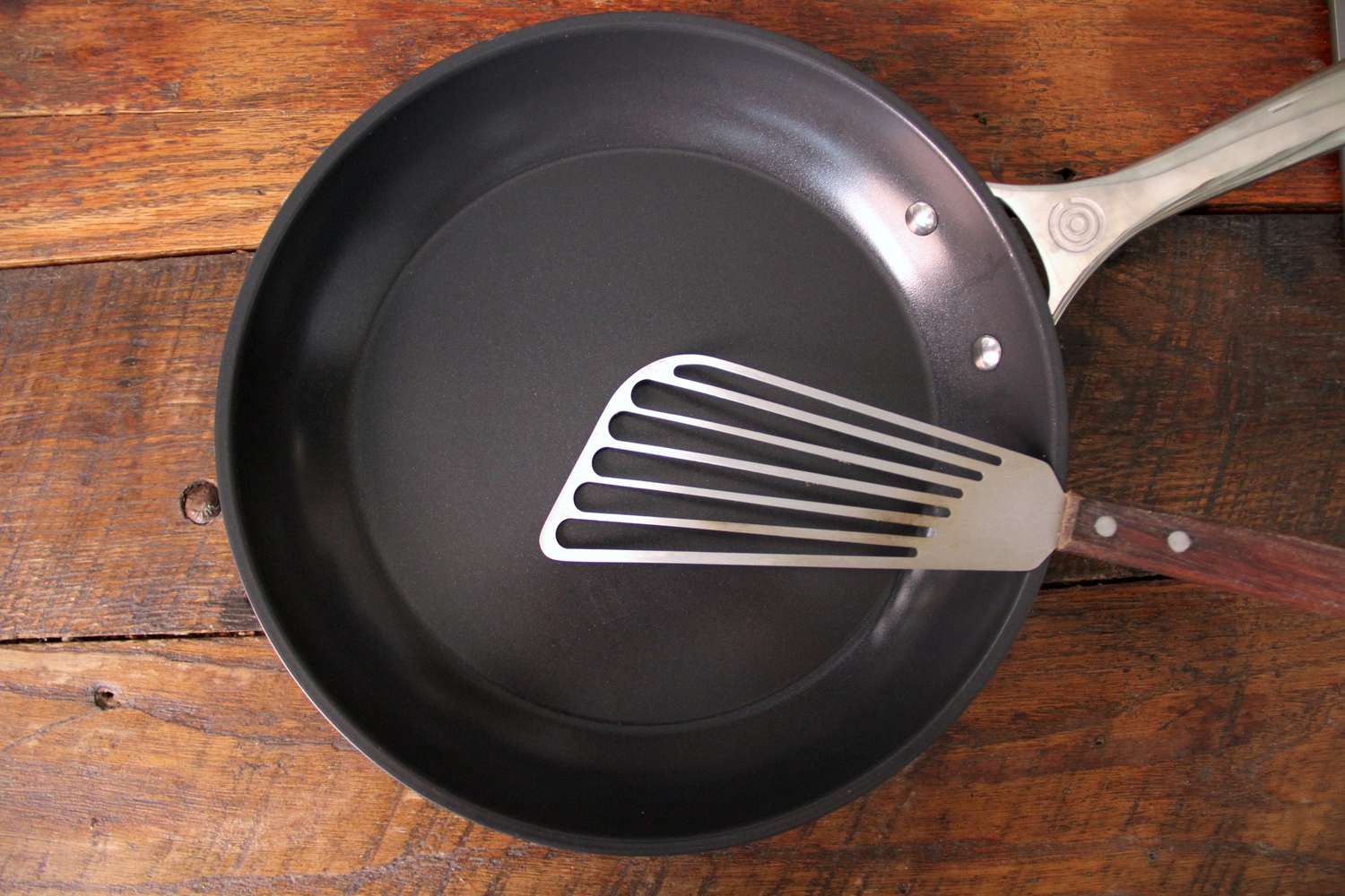 A spatula in the Le Creuset Ceramic Nonstick Frying Pan