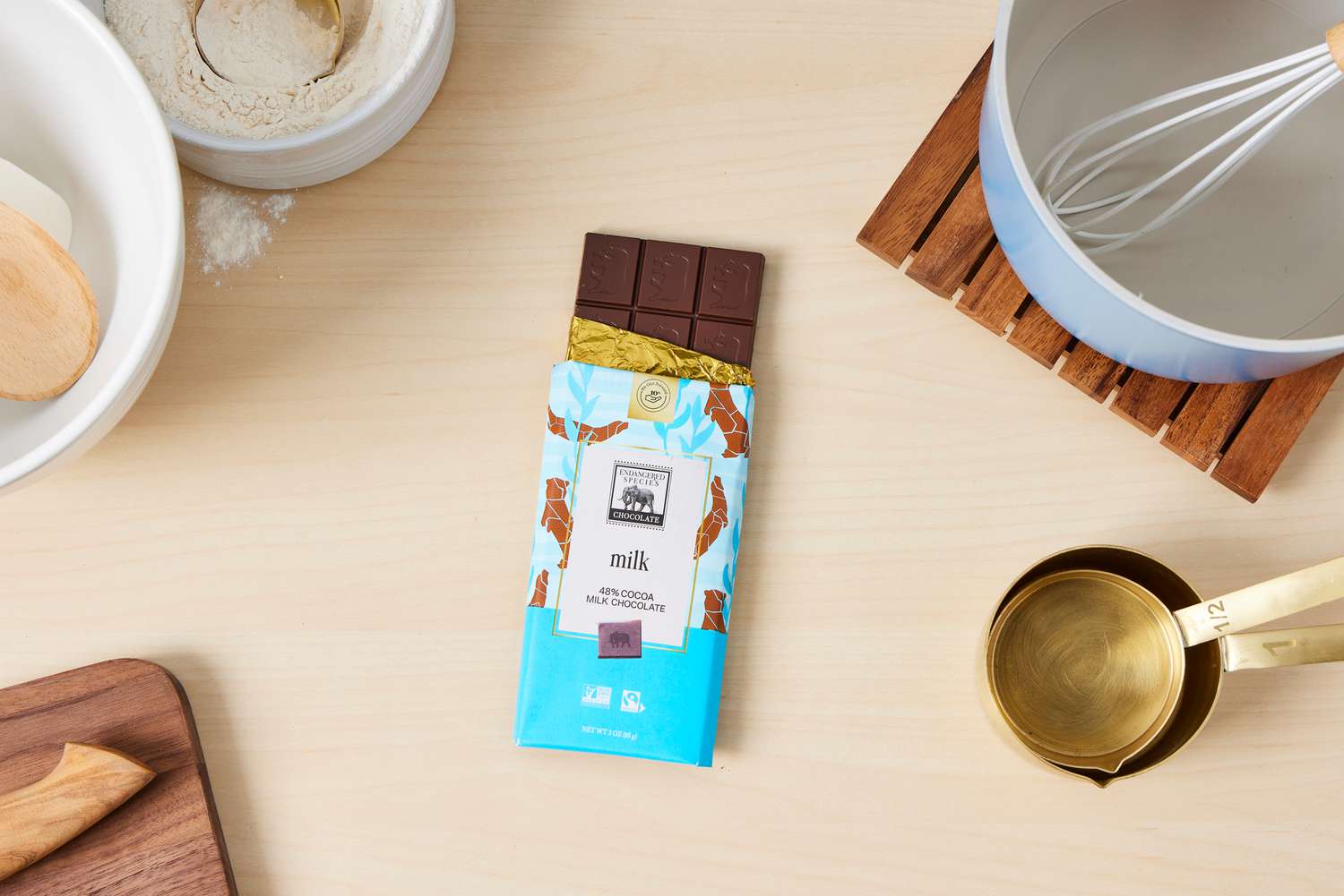 A milk chocolate bar on a kitchen countertop.