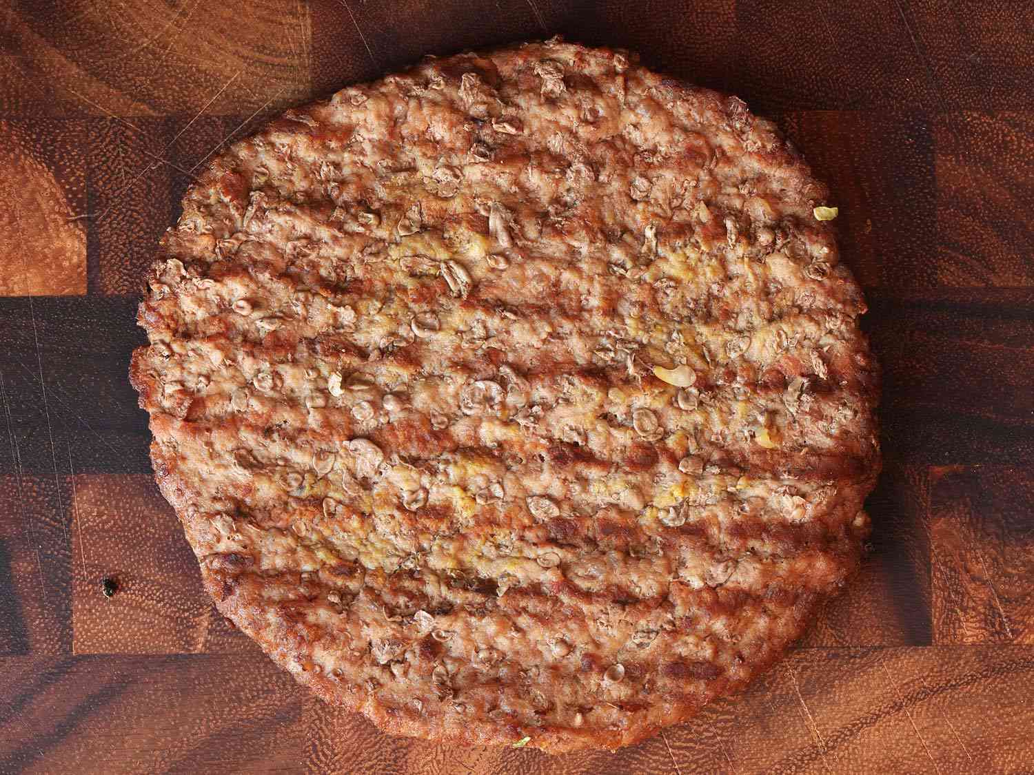 Overhead close-up of a Whopper patty.