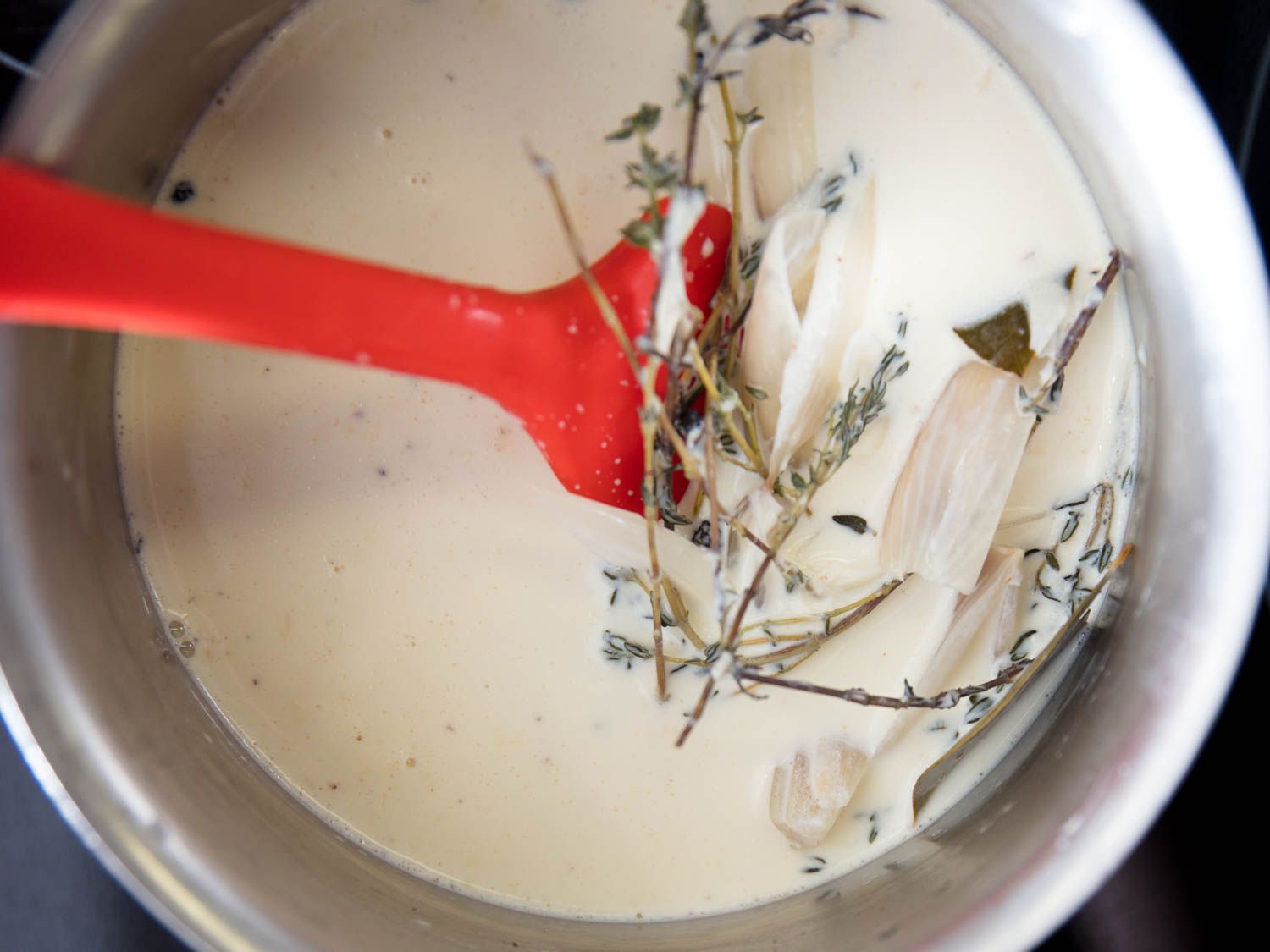 Aromatics steeping in hot milk.