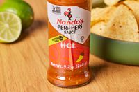 Close up of Nando's Extra Extra Hot Peri Peri Sauce (4-Pack)