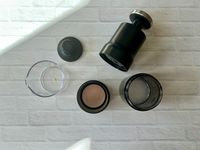 The parts of the OXO Rapid Brewer laid out on a white surface