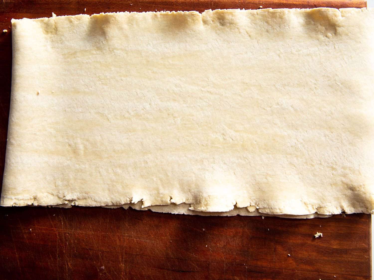 Sheet of ramen dough, ready for kneading in a pasta roller