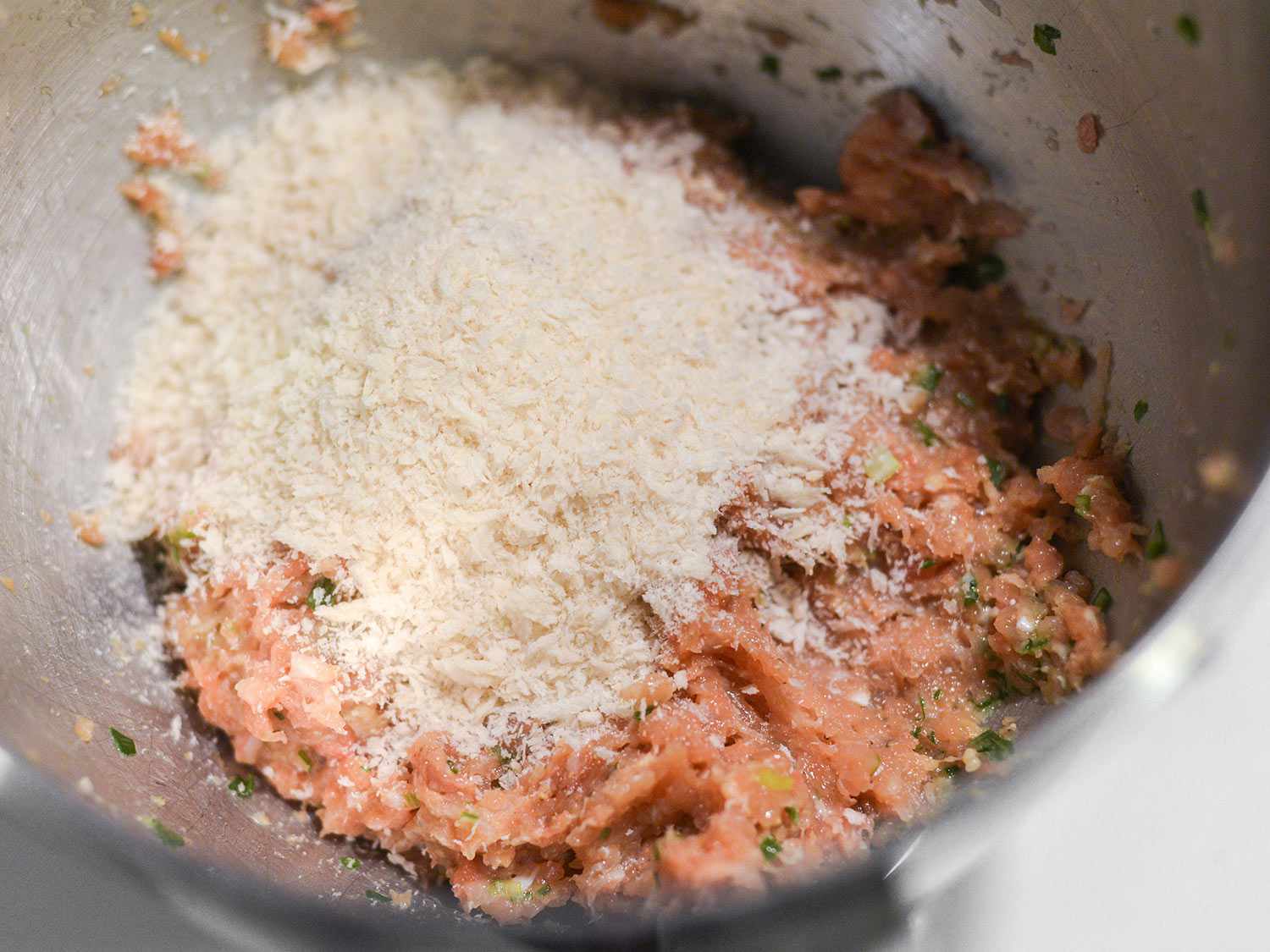Panko is added to the tsukune mixture to give the meatballs a more cohesive structure.