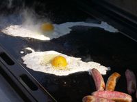 two fried eggs on the griddle
