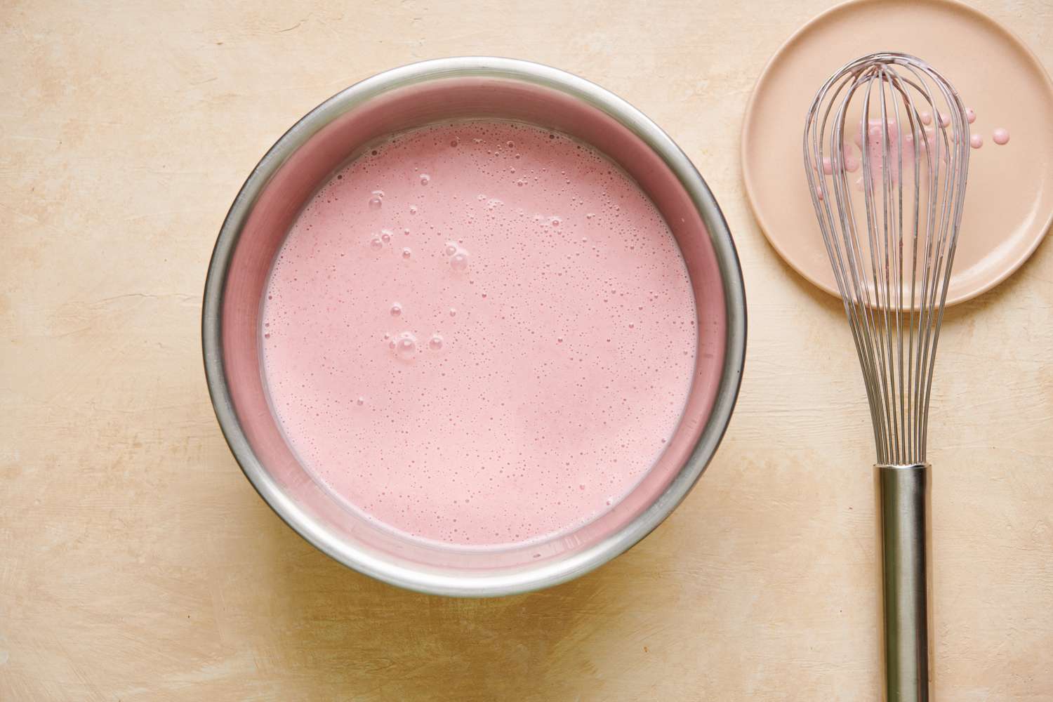 1 Â½ cups of strawberry purÃ©e, half-and-half, corn syrup, and remaining Â¾ cup of sugar fully combined in a bowl.