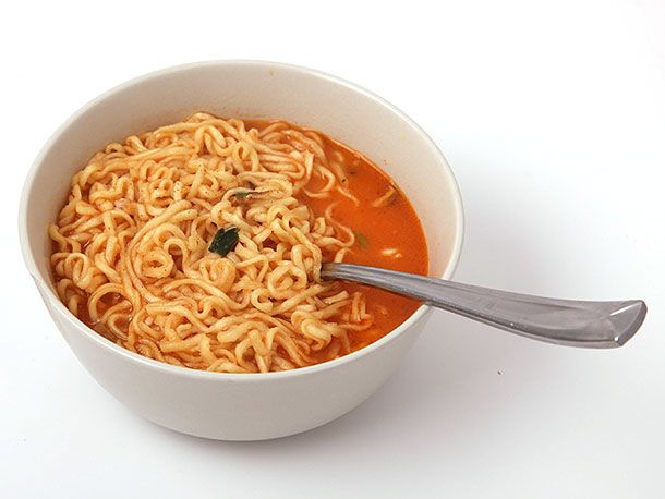 A bowl of Shin Cup BLACK Premium noodle soup.