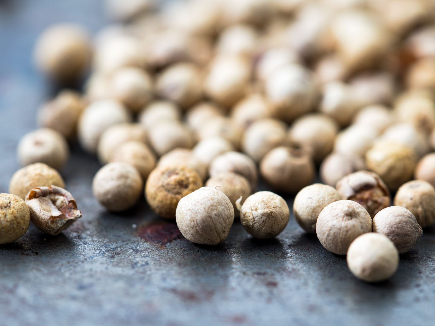 Macro closeup of Penja white peppercorns