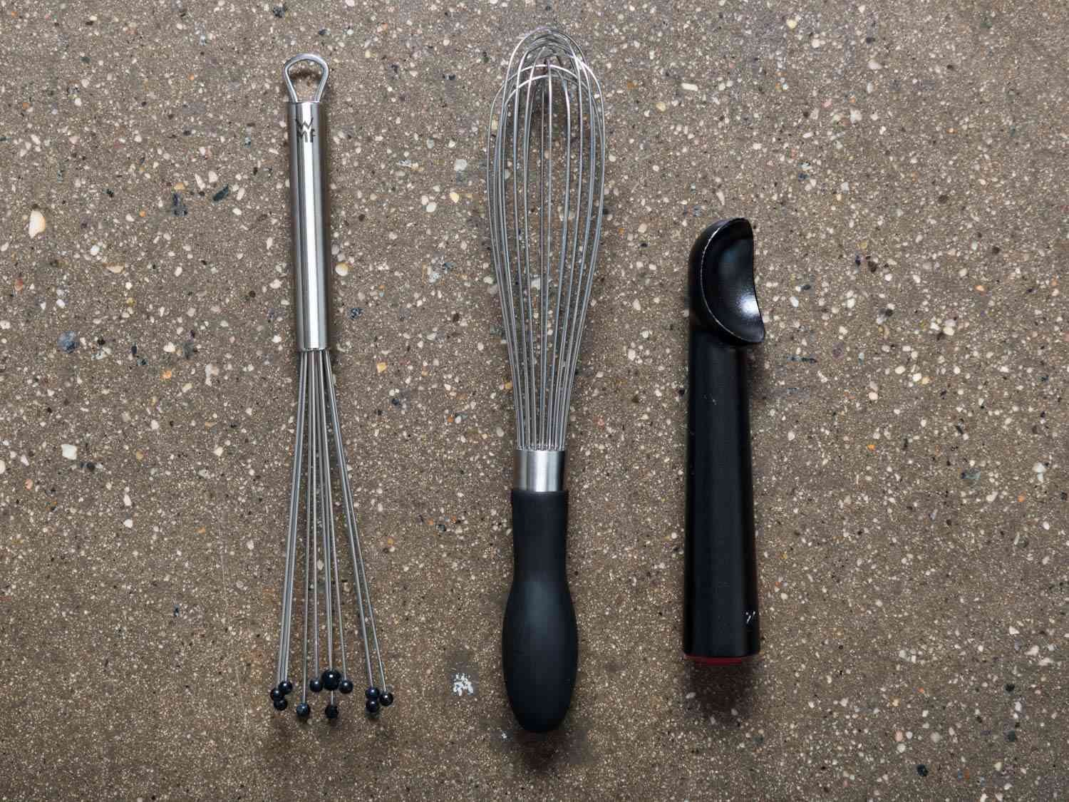 Whisks and an ice cream scoop.