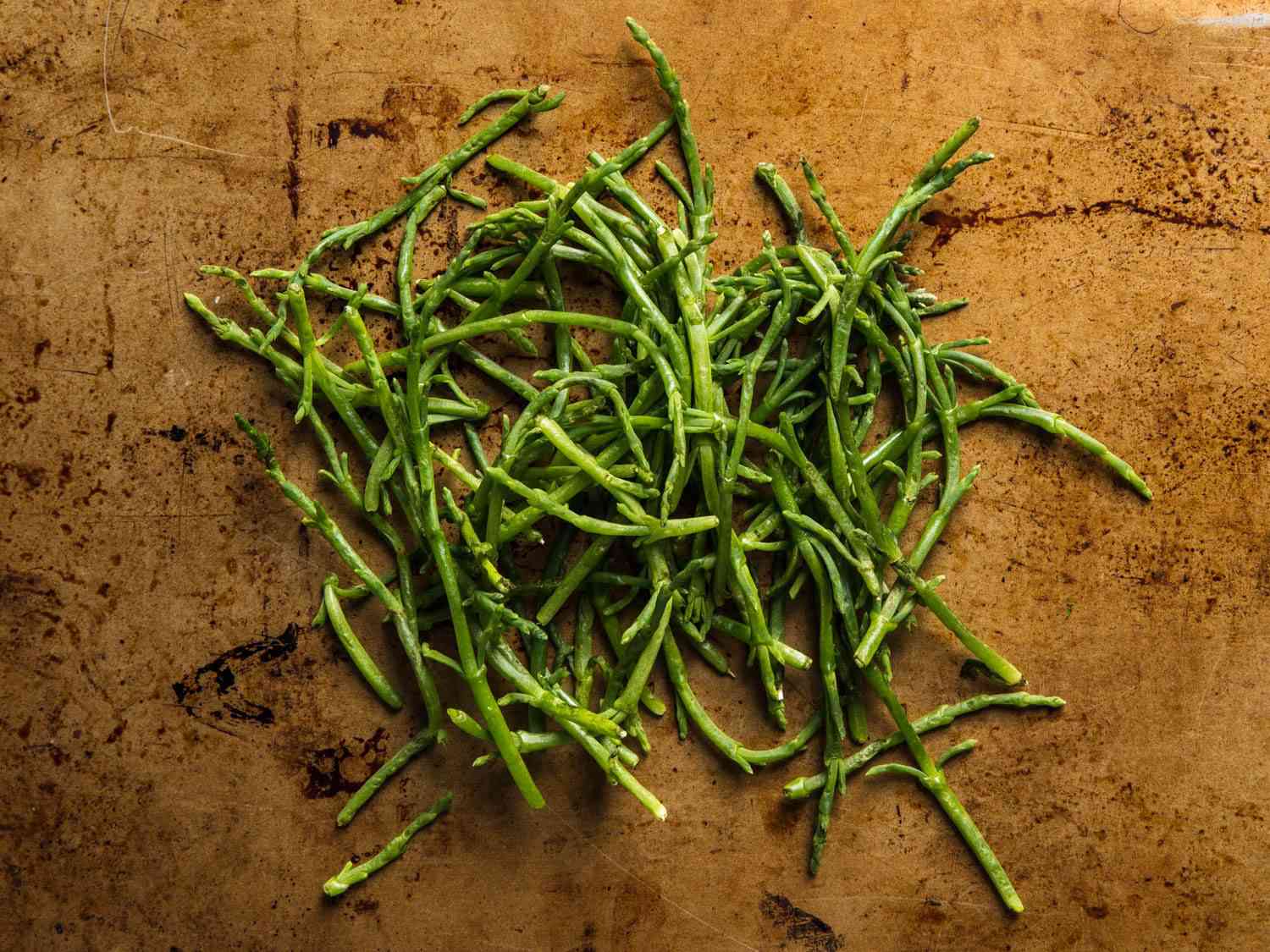 A pile of green sea beans (a.k.a. samphire or Salicornia), viewed from above
