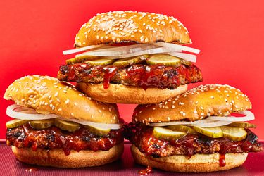 Side view of 3 ultimate McRib sandwiches.