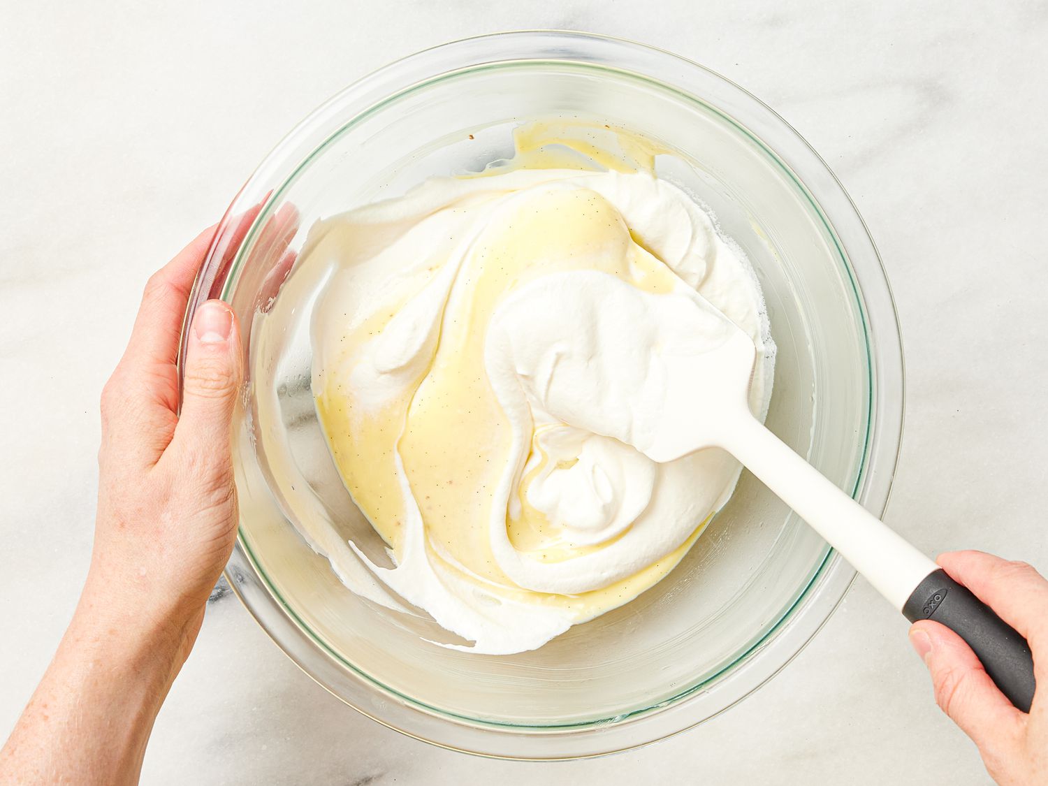 Folding mixture together with a silicone spatula