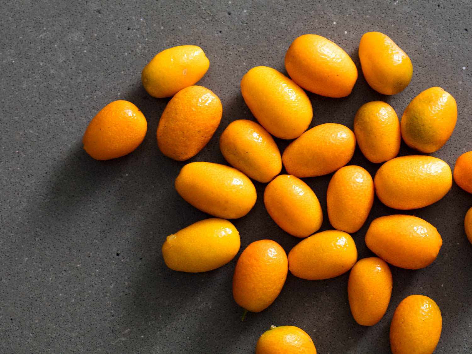 A scattering of orange kumquats.