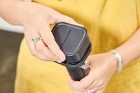 A person assembles the KitchenAid Go Cordless Hand Blender