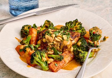 A plated dish featuring chicken with vegetables and sauce