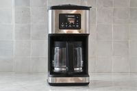 Zojirushi Dome Programmable Coffee Maker with a display, control buttons, and two glass carafes