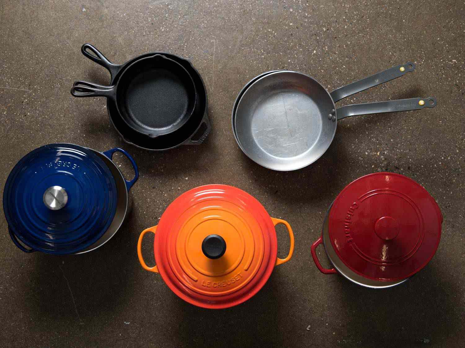 Cast iron and carbon steel cookware, plus enameled cast iron Dutch ovens.