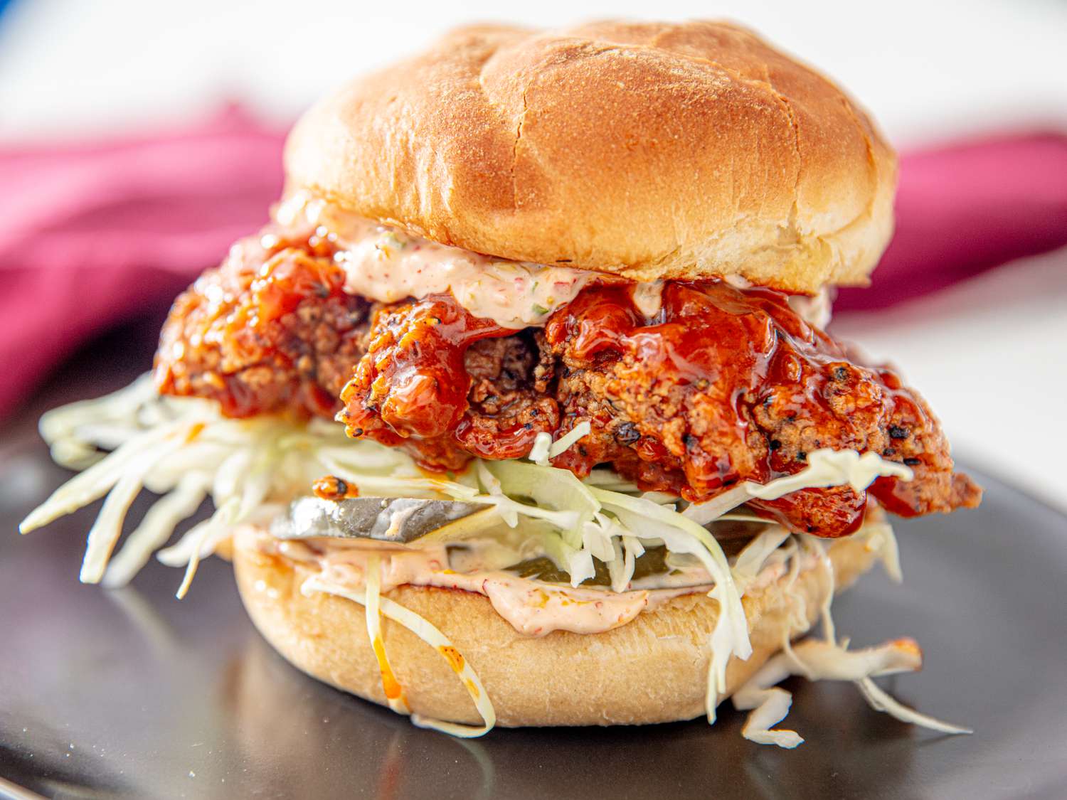 Side view of kimchi fried chicken Sandwich 