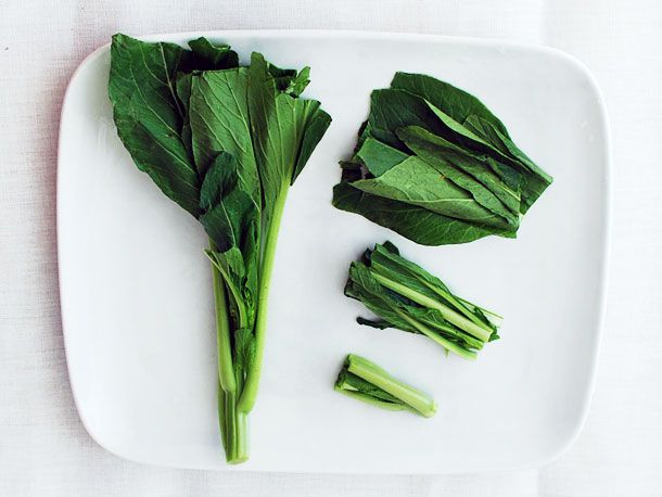Chinese broccoli cut down into smaller sections for stir-frying