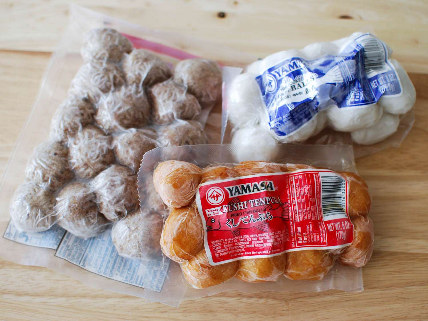 Packages of frozen fish balls for Chinese hot pot.