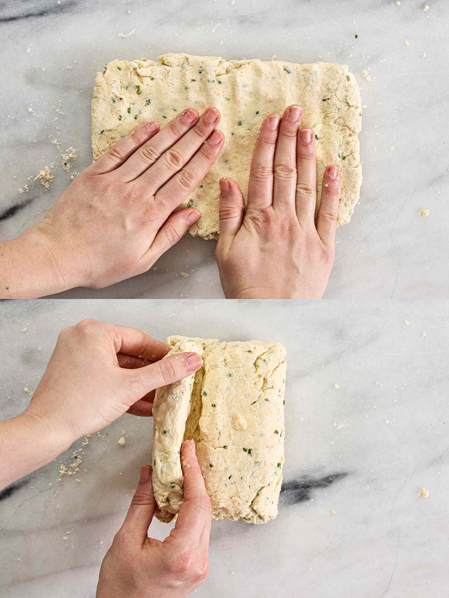 2 image collage. Top: hands pressing dough into a rectangle shape on white marble. Bottom: Folding dough over itself 