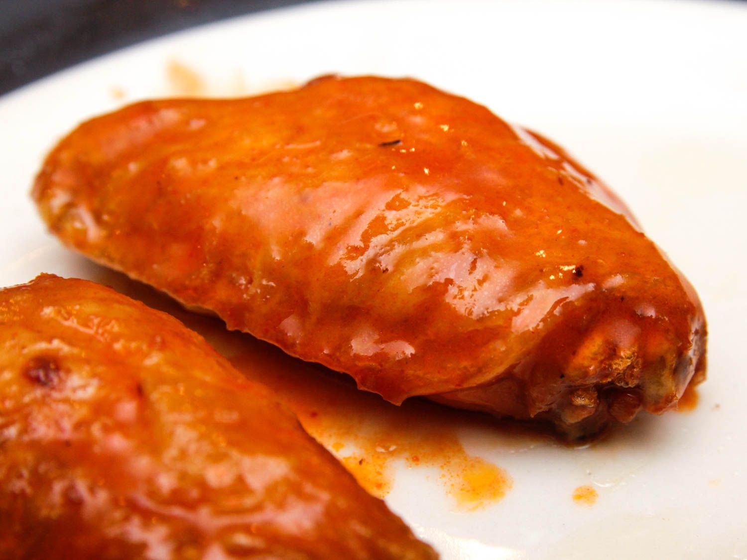 Closeup view of buffalo chicken wing flats fried from raw