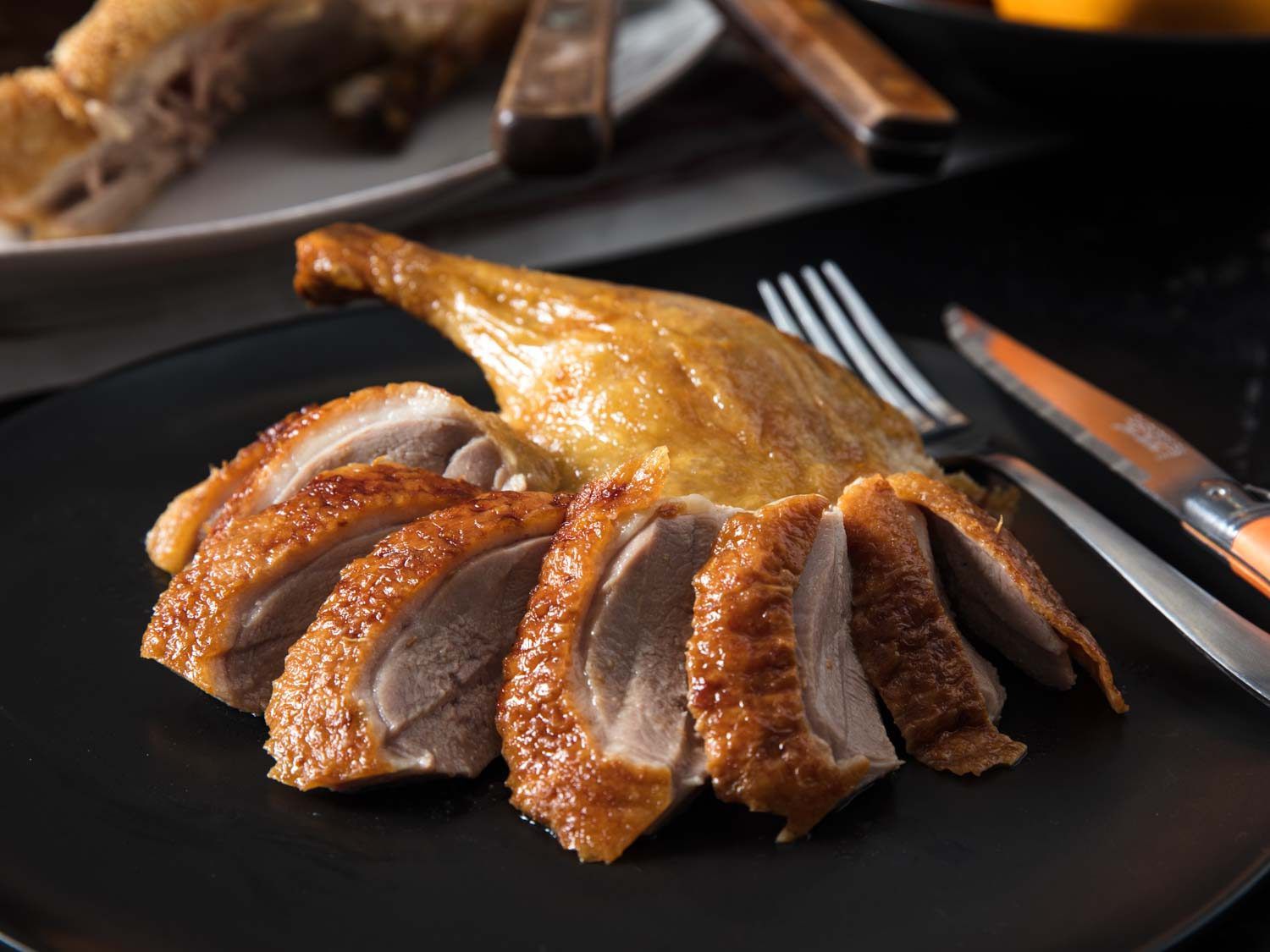 Sliced breast meat and a duck leg for Duck à l'Orange