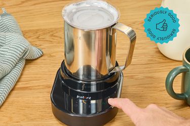 the instant pot magic frother on a wooden surface