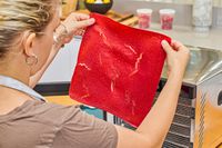 Person holding food leather