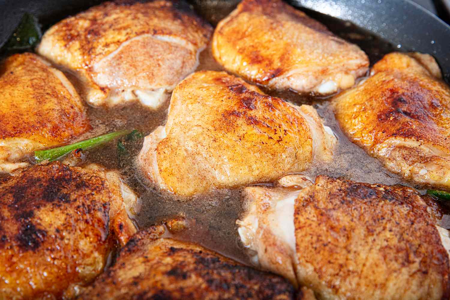 Side view of chicken braising
