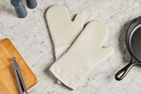 OXO oven mitts on a marble surface