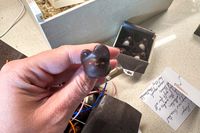 Person holding item from LA Burdick The Essential Burdick Collection