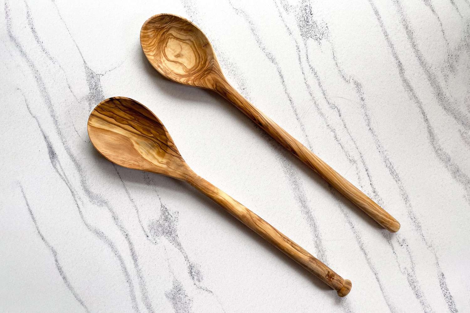 Sabatier All-Purpose Spoons on a marble countertop