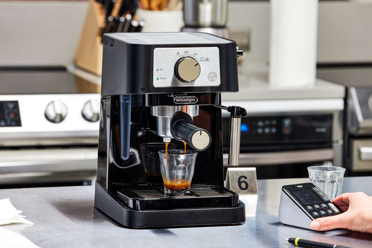 The De'Longhi Stilosa Espresso Machine brewing an espresso