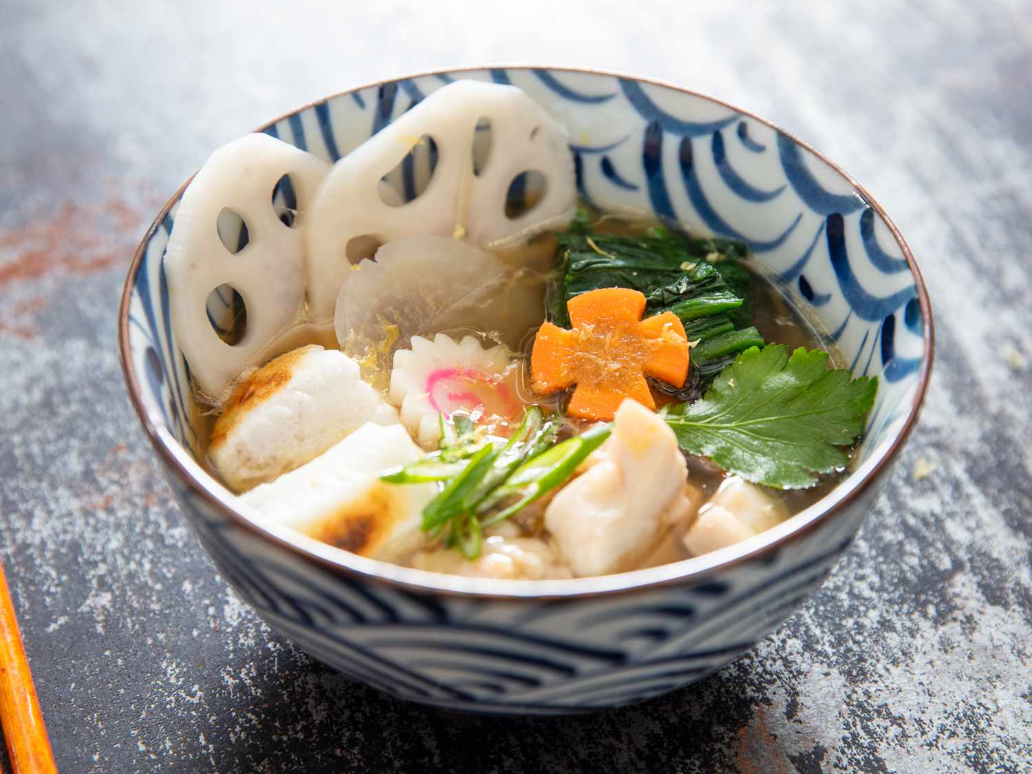 A bowl of Japanese ozoni chicken and mochi soup for New Year.