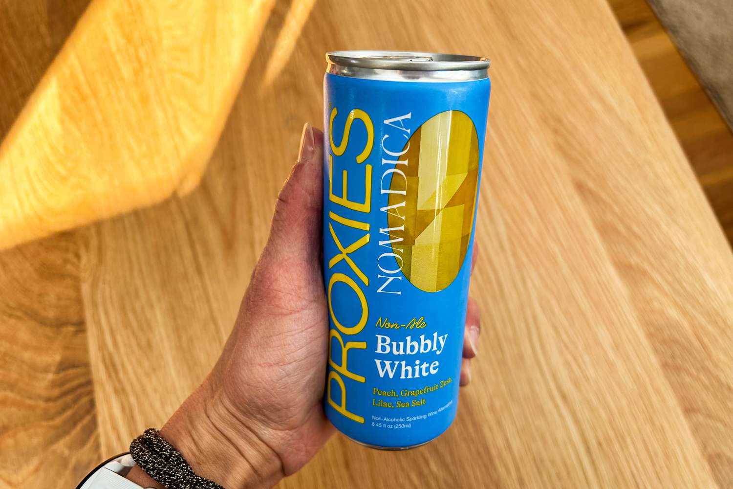 A can of Proxies nonalcoholic sparkling wine