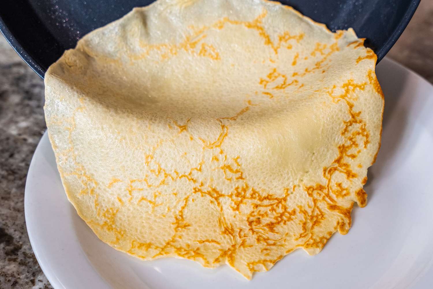 A crepe cooked in the OXO Non-Stick Pro 10-Inch Frypan