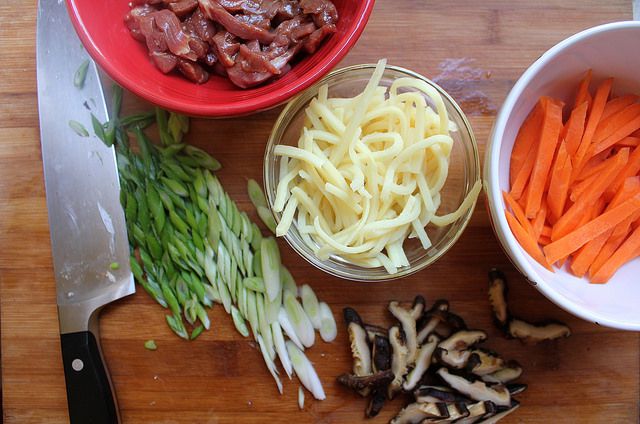 Overhead shot of prepped ingredients for pan-fried rice noodles.