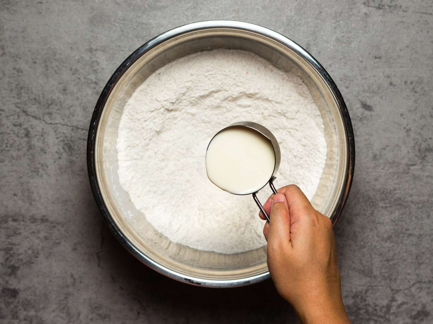 Overhead view of adding milk