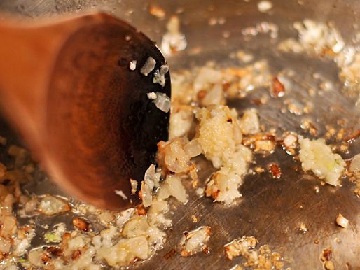 Sauteing onion and garlic in oil.