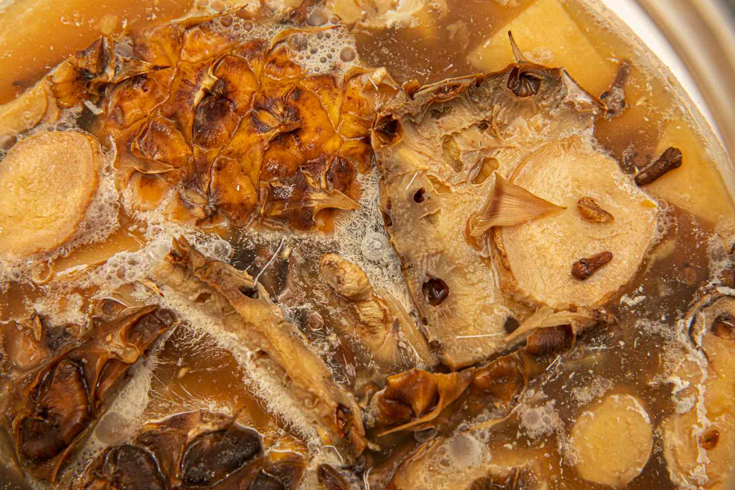 Overhead view of kahm yeast forming on the top of tepache 
