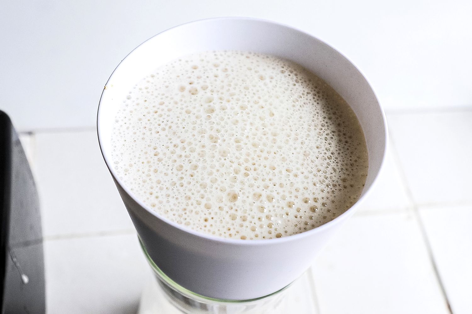 nut milk straining through the chefn