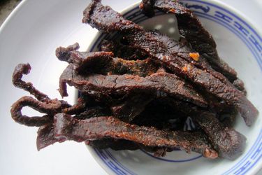 A bowl of homemade beef jerky. 