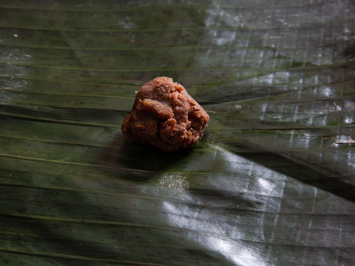 shrimp paste in the middle of banana leaf