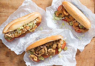 Shrimp, Oyster, and Fish Po' Boy sandwiches on sandwich paper