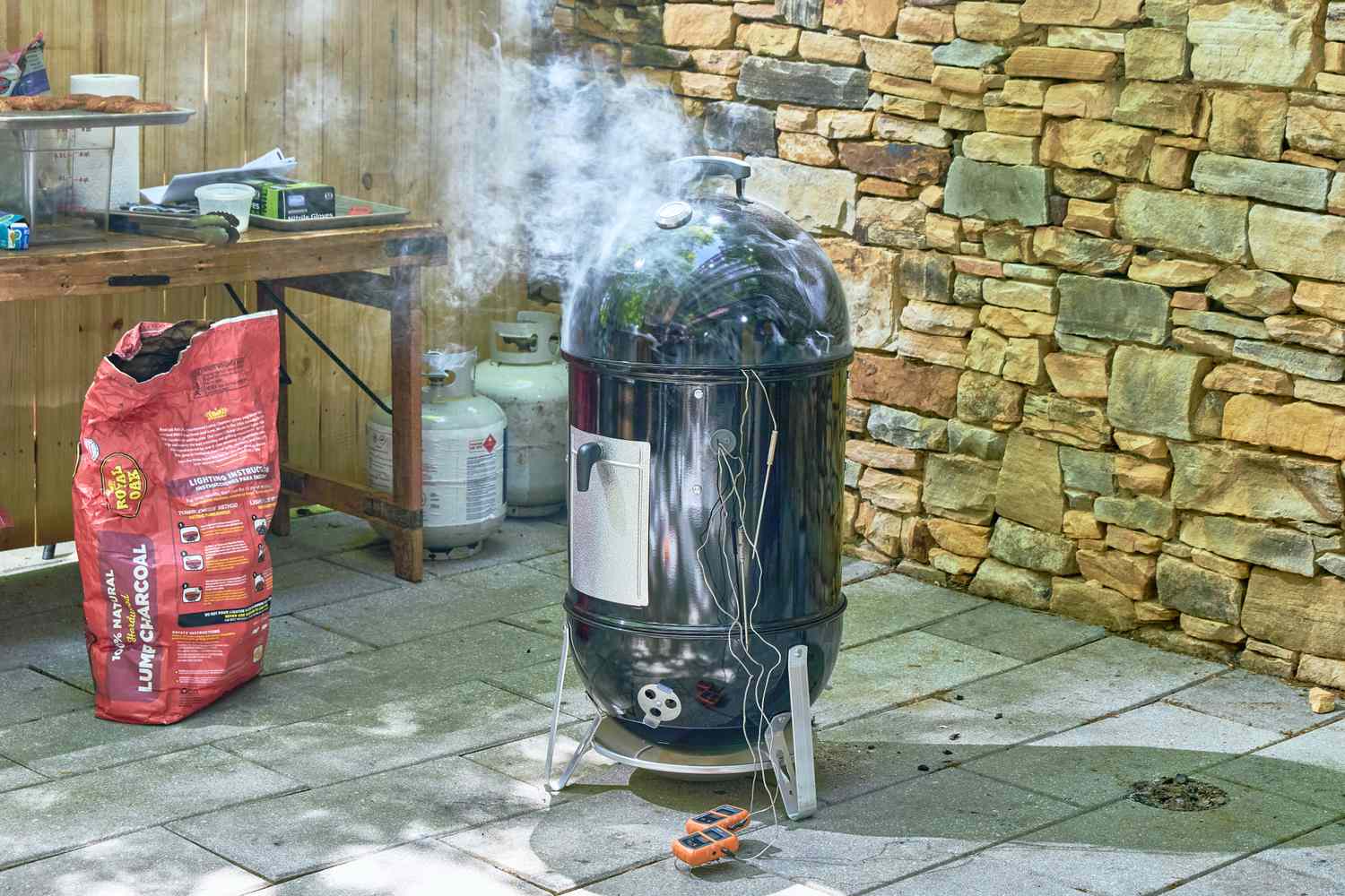The Weber 18-Inch Smokey Mountain Cooker on a patio
