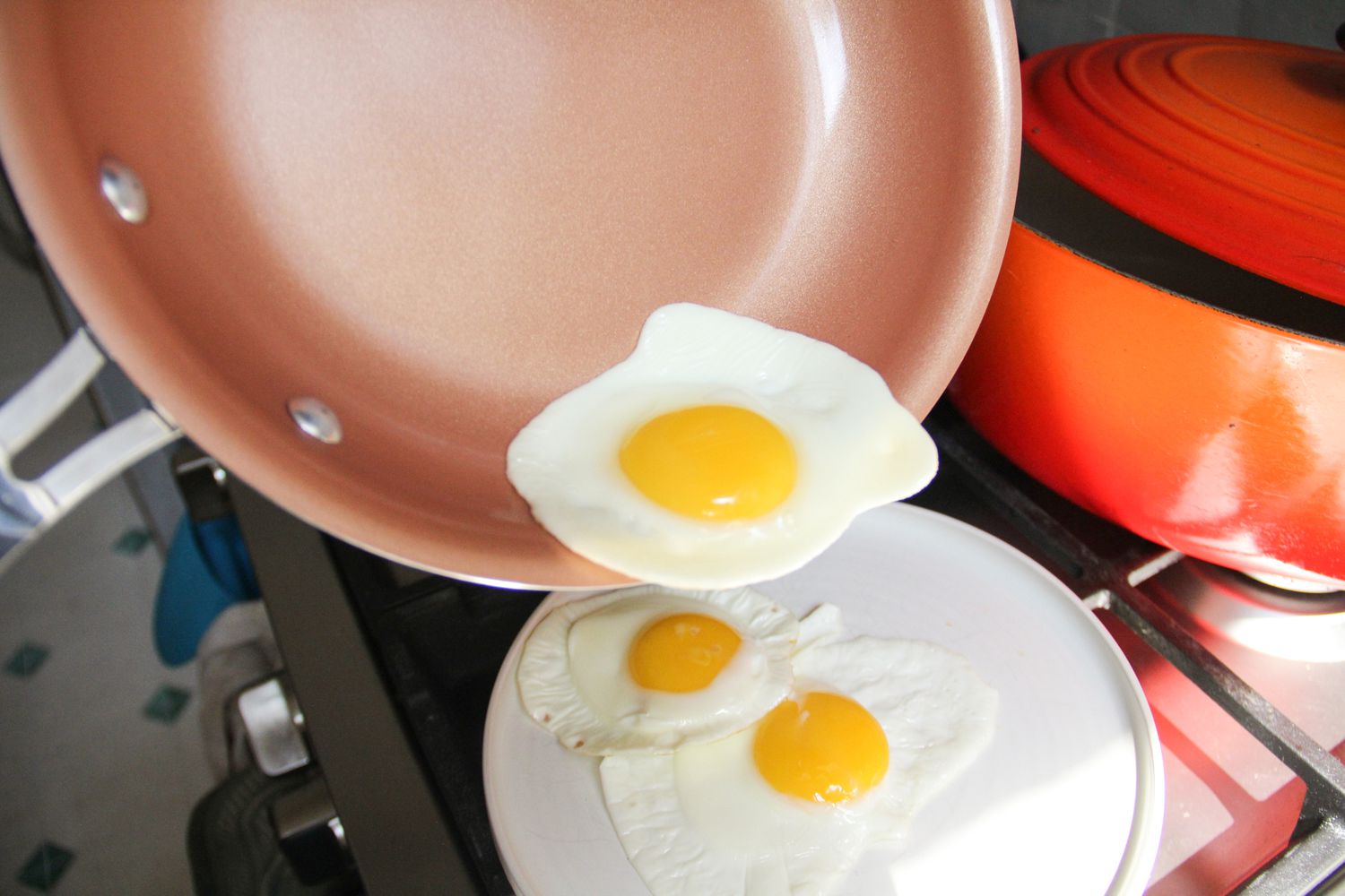 An egg being poured off the Gotham Steel Nonstick Frying Pan