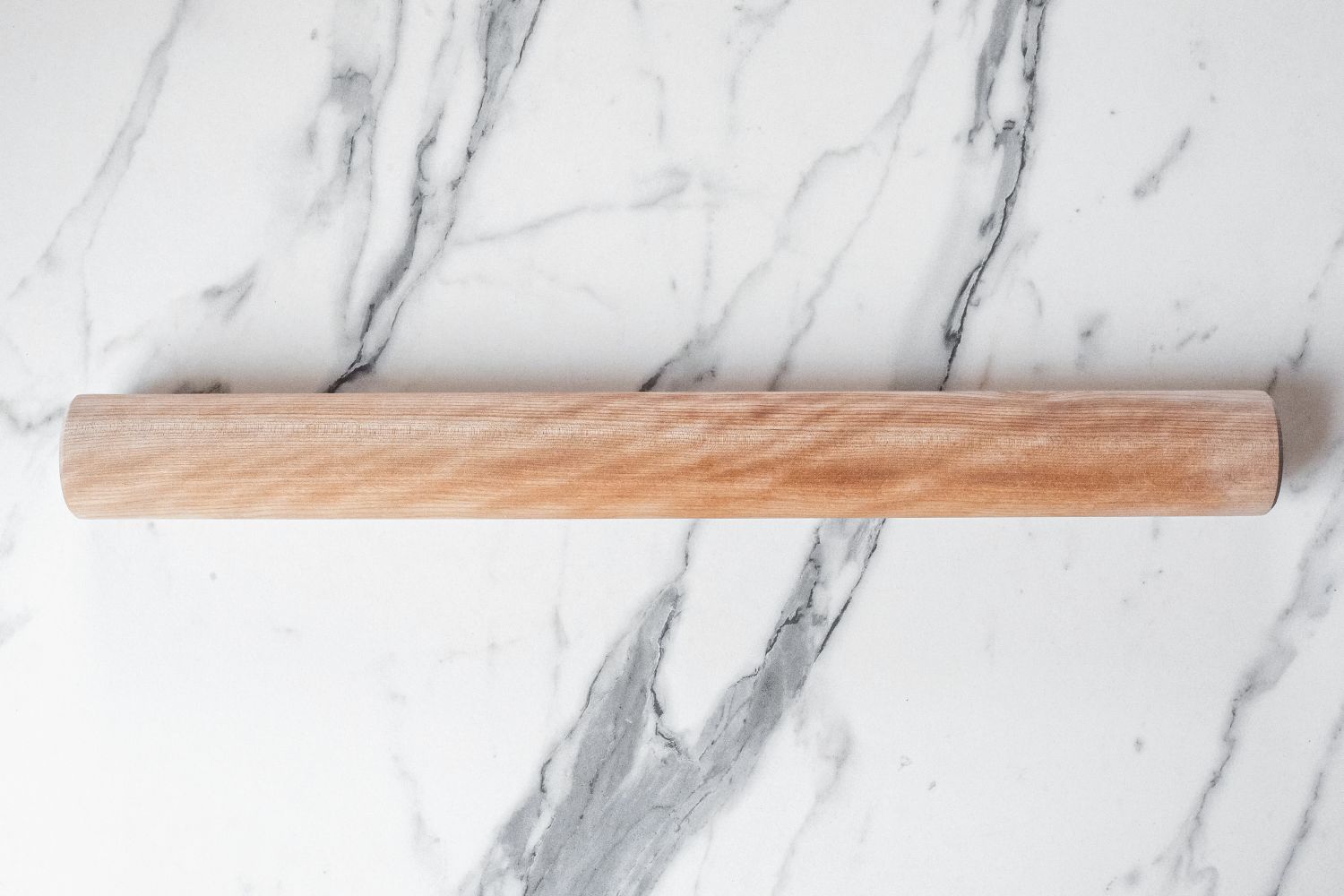 J.K. Adams Dowel Rolling Pin on a marble surface
